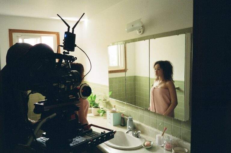 Cinematographer John Ker filming a real cancer survivor.